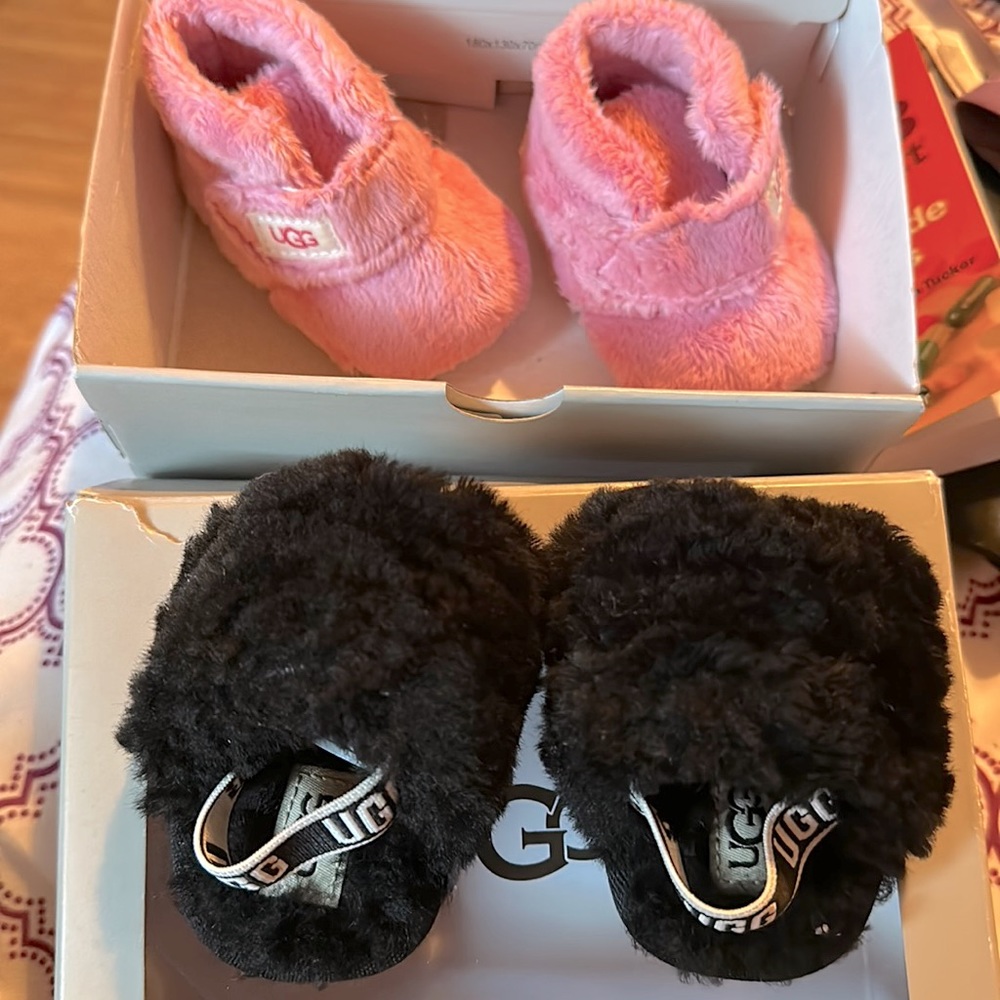 2 pairs of baby Ugg’s only worn once when she was a newborn.